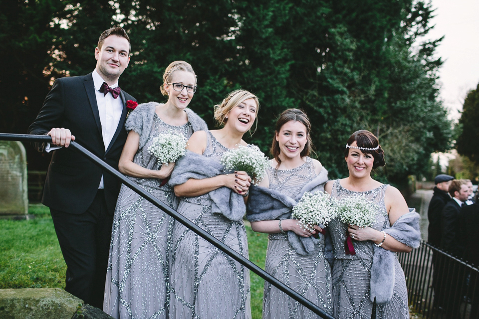 Laura wears 'Mimosa' by Jenny Packham for her winter wedding on the family farm in York. Photography by Kate Gray.