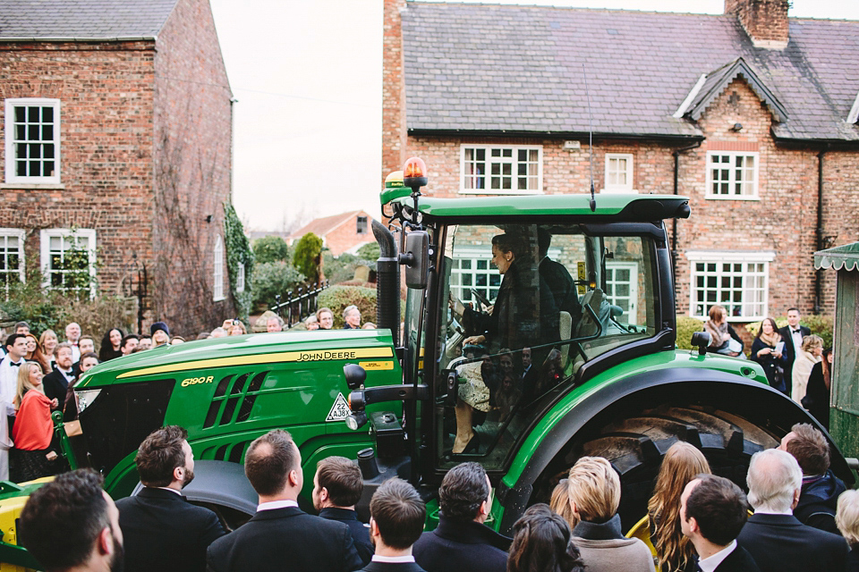 Laura wears 'Mimosa' by Jenny Packham for her winter wedding on the family farm in York. Photography by Kate Gray.