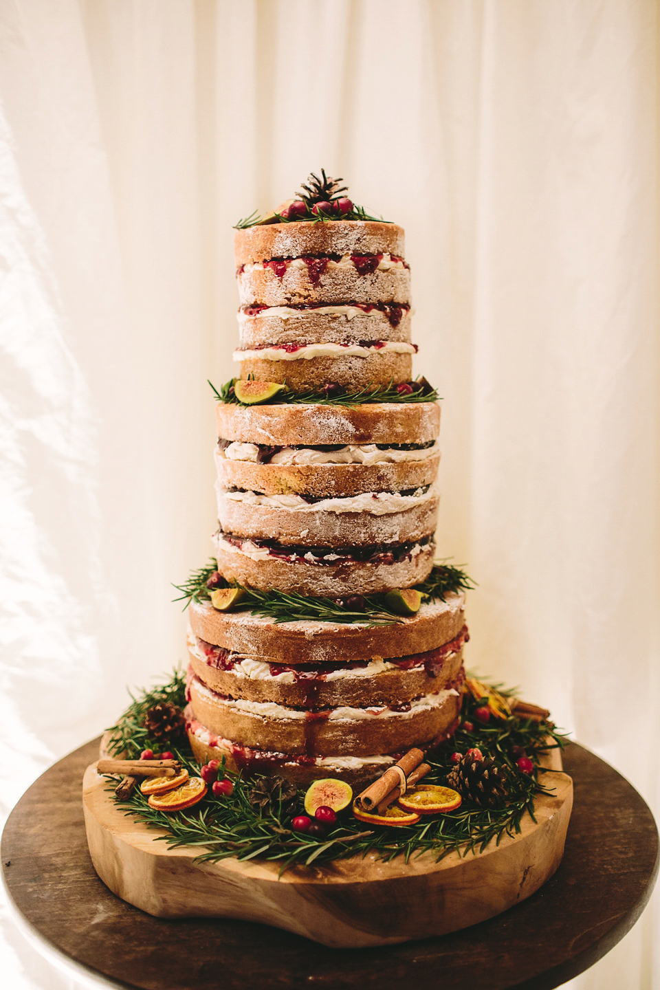 Laura wears 'Mimosa' by Jenny Packham for her winter wedding on the family farm in York. Photography by Kate Gray.