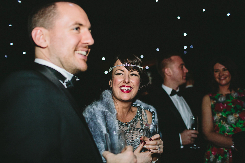 Laura wears 'Mimosa' by Jenny Packham for her winter wedding on the family farm in York. Photography by Kate Gray.