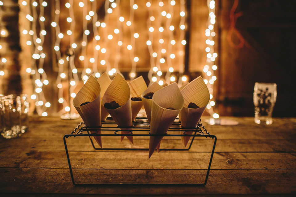 Laura wears 'Mimosa' by Jenny Packham for her winter wedding on the family farm in York. Photography by Kate Gray.