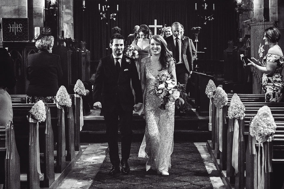 Our Lovettes member Emily wore a glamorous Jenny Packham gown for her elegant, English country wedding at Shustoke Farm Barns. Photography by Mister Phill.