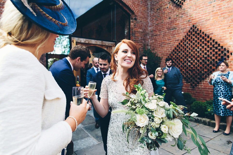 Our Lovettes member Emily wore a glamorous Jenny Packham gown for her elegant, English country wedding at Shustoke Farm Barns. Photography by Mister Phill.