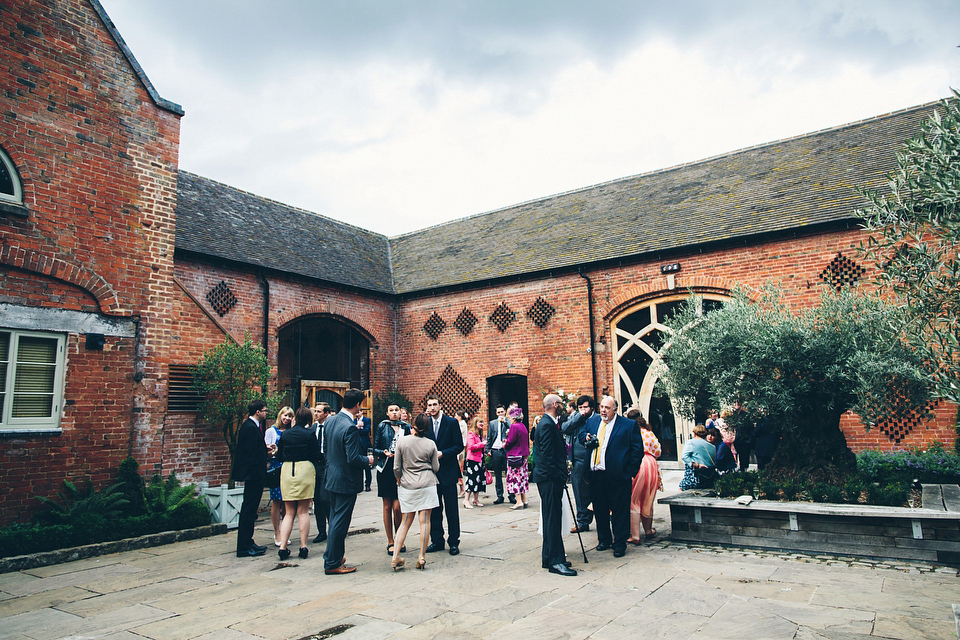 Our Lovettes member Emily wore a glamorous Jenny Packham gown for her elegant, English country wedding at Shustoke Farm Barns. Photography by Mister Phill.