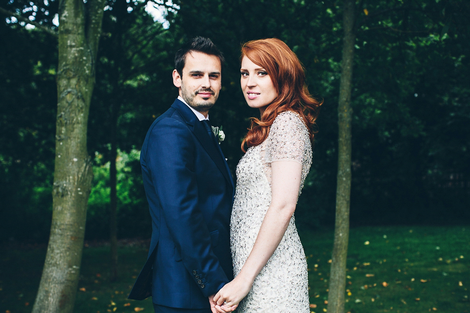 Our Lovettes member Emily wore a glamorous Jenny Packham gown for her elegant, English country wedding at Shustoke Farm Barns. Photography by Mister Phill.