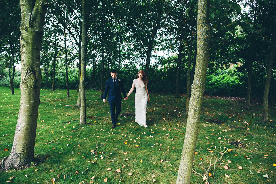 Our Lovettes member Emily wore a glamorous Jenny Packham gown for her elegant, English country wedding at Shustoke Farm Barns. Photography by Mister Phill.