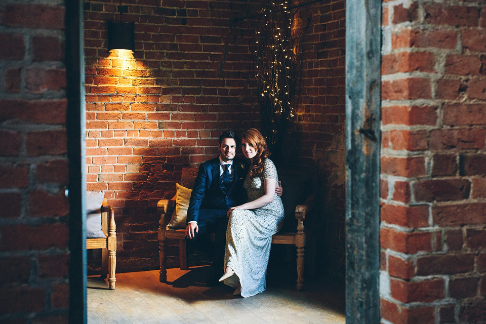 Our Lovettes member Emily wore a glamorous Jenny Packham gown for her elegant, English country wedding at Shustoke Farm Barns. Photography by Mister Phill.