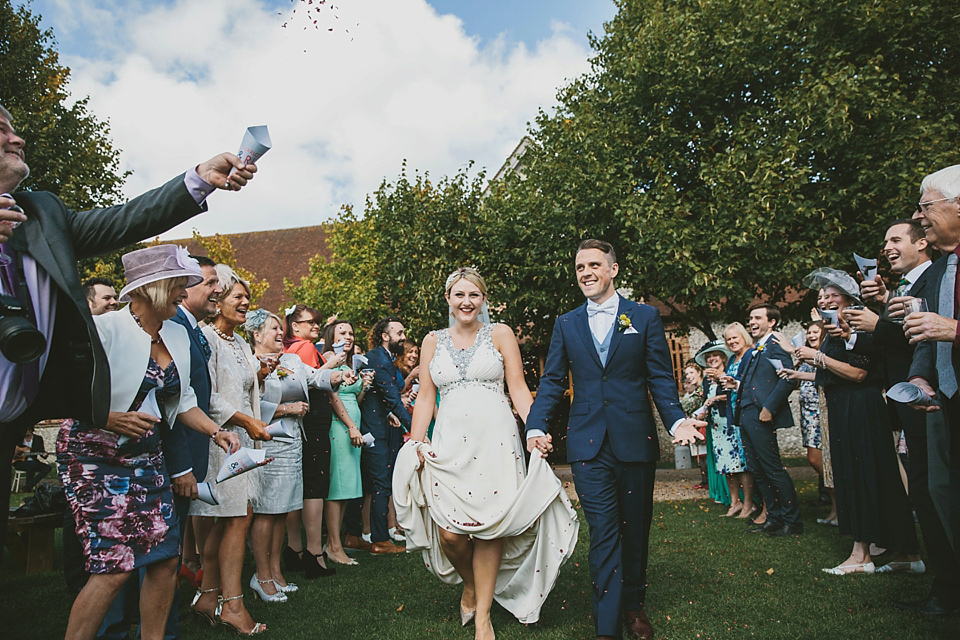 Our Lovettes/blogging bride member Charlotte wears Jenny Packham for her Wes Anderson inspired barn wedding at The Tithe Bar in Petersfield. Photography by McKinley Rodgers.