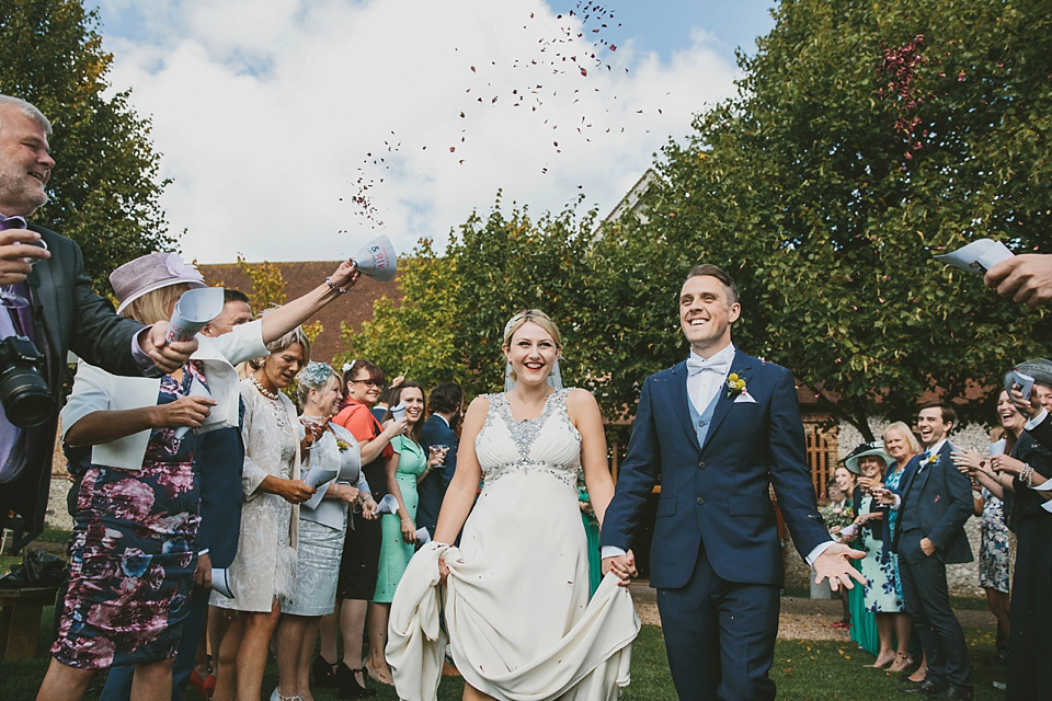 Our Lovettes/blogging bride member Charlotte wears Jenny Packham for her Wes Anderson inspired barn wedding at The Tithe Bar in Petersfield. Photography by McKinley Rodgers.