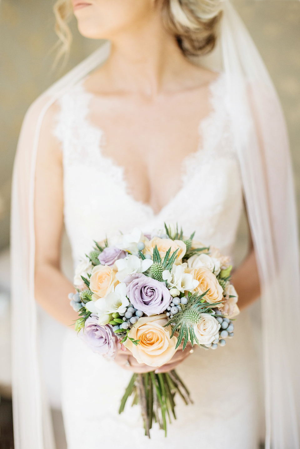 An Essense of Australia dress for a homespun, outdoor, country wedding in pretty pastel shades. Photography by Julie Tinton.