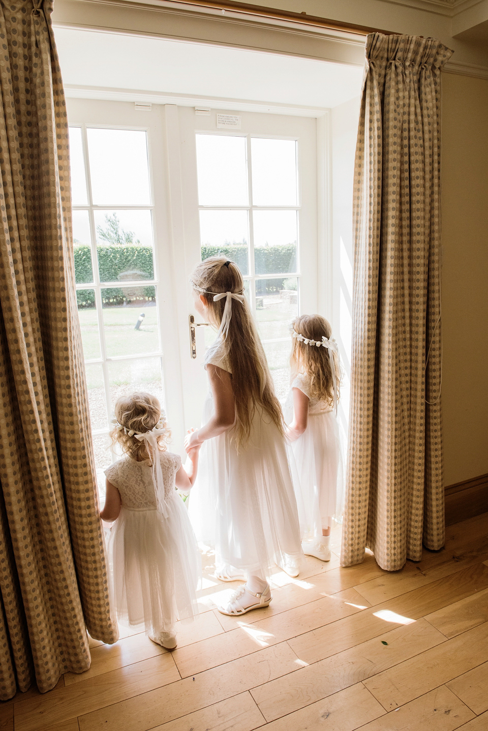 An Essense of Australia dress for a homespun, outdoor, country wedding in pretty pastel shades. Photography by Julie Tinton.