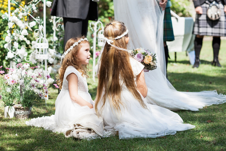 An Essense of Australia dress for a homespun, outdoor, country wedding in pretty pastel shades. Photography by Julie Tinton.