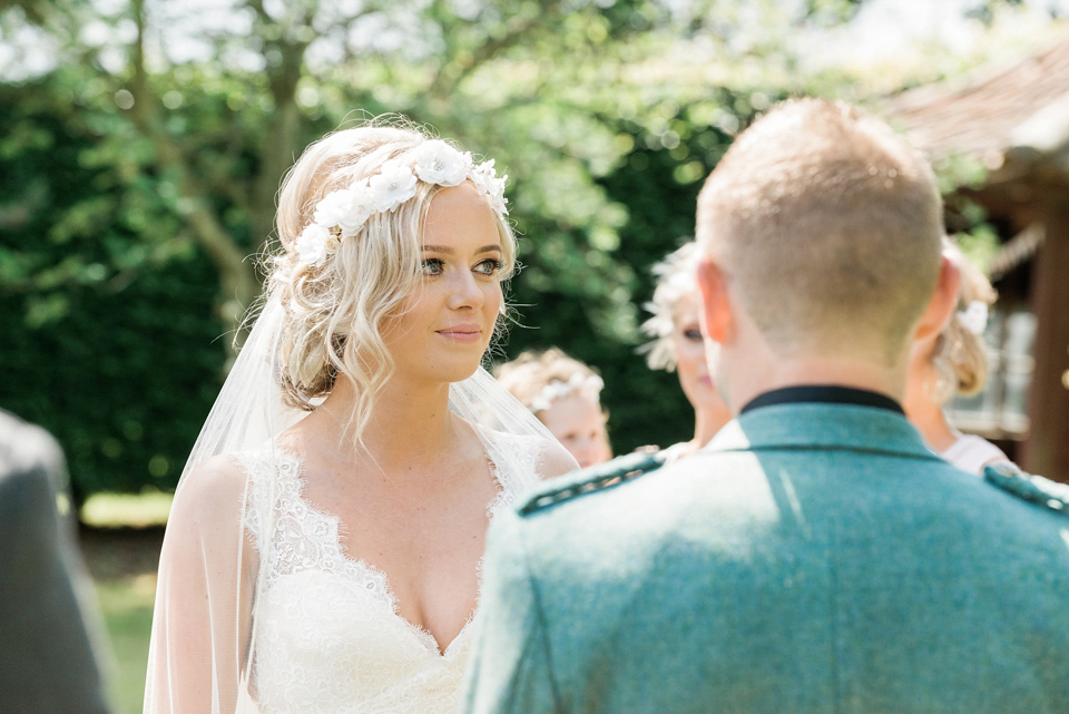 An Essense of Australia dress for a homespun, outdoor, country wedding in pretty pastel shades. Photography by Julie Tinton.