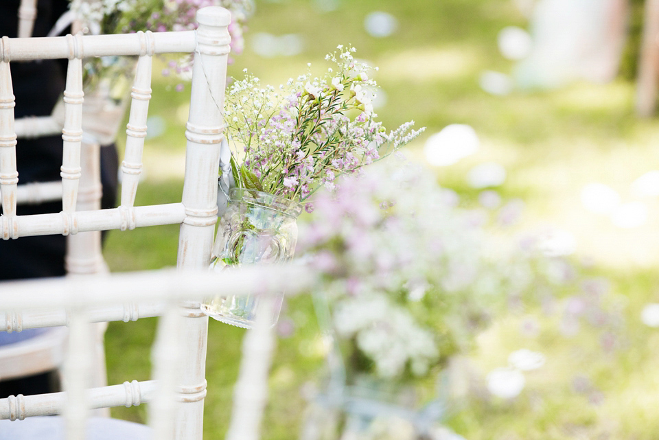 An Essense of Australia dress for a homespun, outdoor, country wedding in pretty pastel shades. Photography by Julie Tinton.