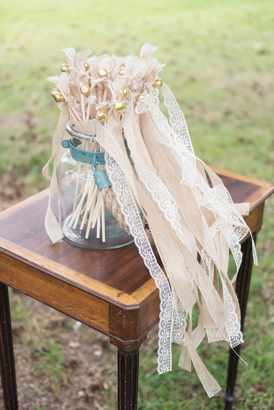 An Essense of Australia dress for a homespun, outdoor, country wedding in pretty pastel shades. Photography by Julie Tinton.