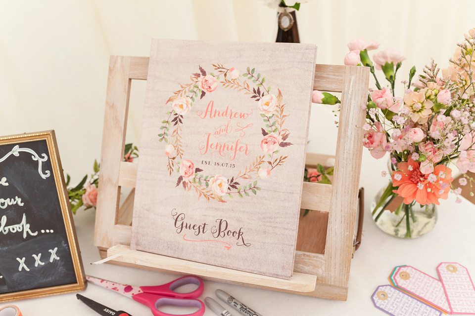 An Essense of Australia dress for a homespun, outdoor, country wedding in pretty pastel shades. Photography by Julie Tinton.