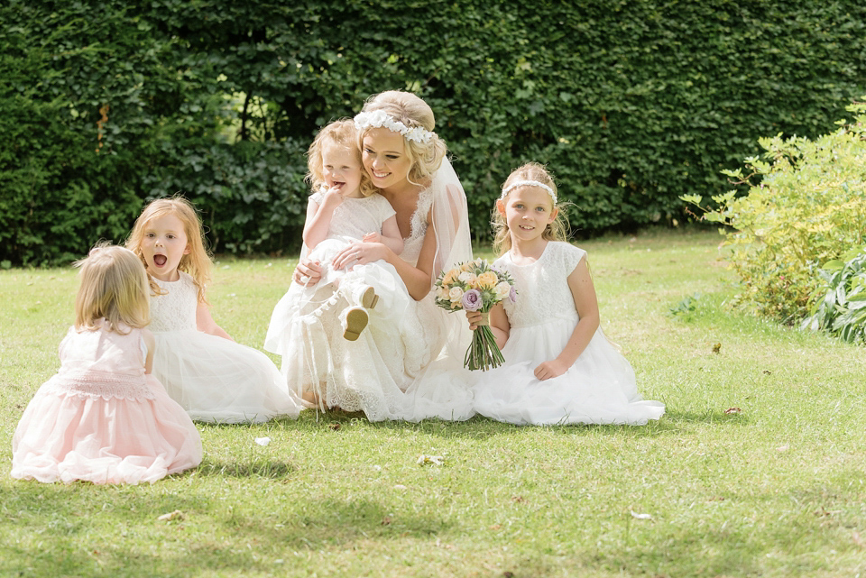 An Essense of Australia dress for a homespun, outdoor, country wedding in pretty pastel shades. Photography by Julie Tinton.