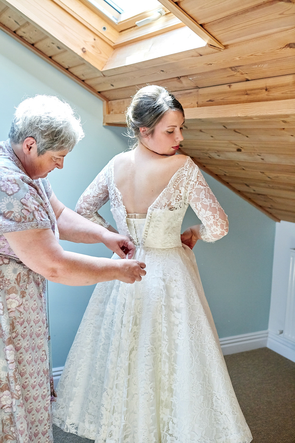 A fabulous 1950's Fur Coat No Knickers dress for a flower-filled Norfolk countryside wedding. Images by Fuller Photography.