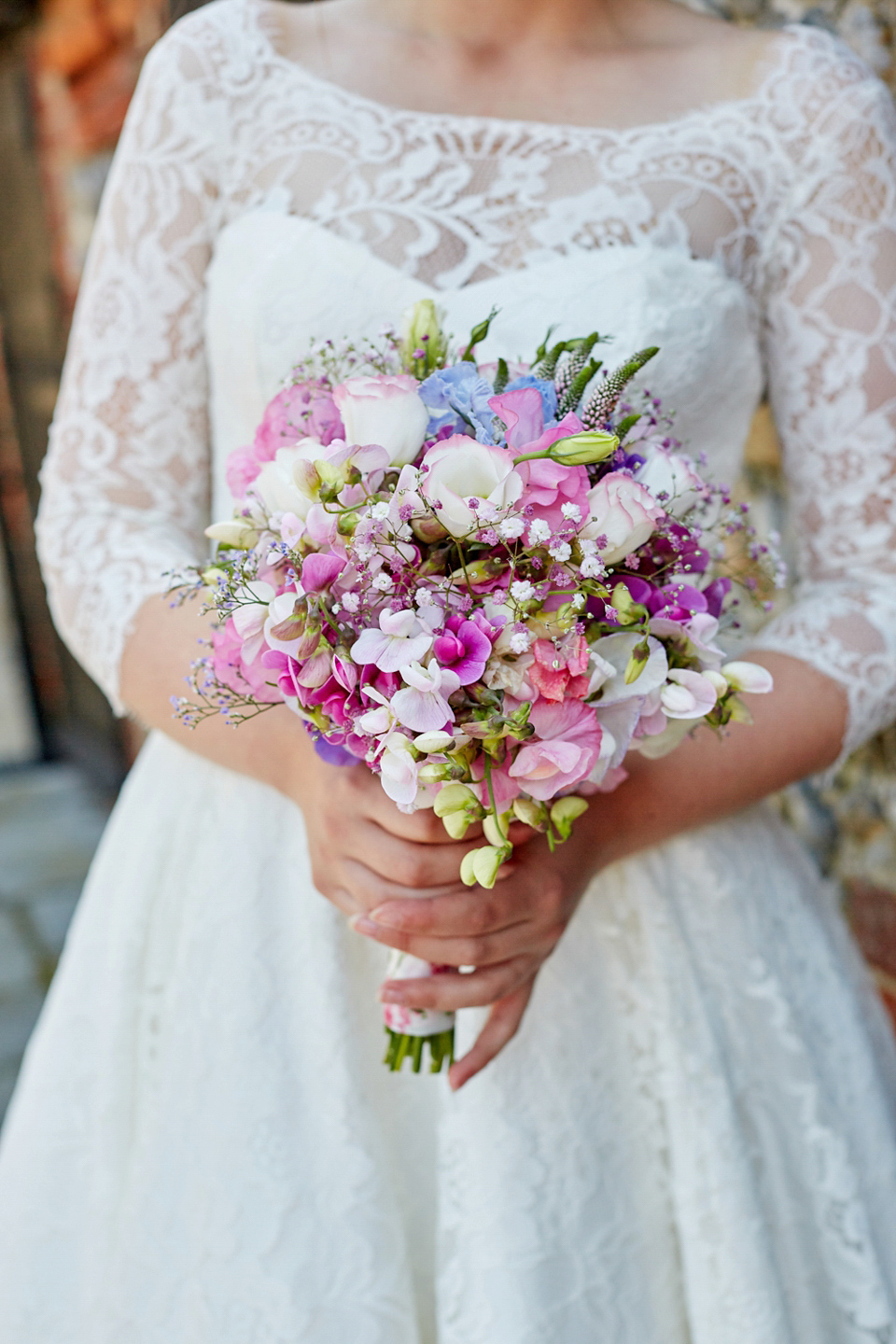 A fabulous 1950's Fur Coat No Knickers dress for a flower-filled Norfolk countryside wedding. Images by Fuller Photography.