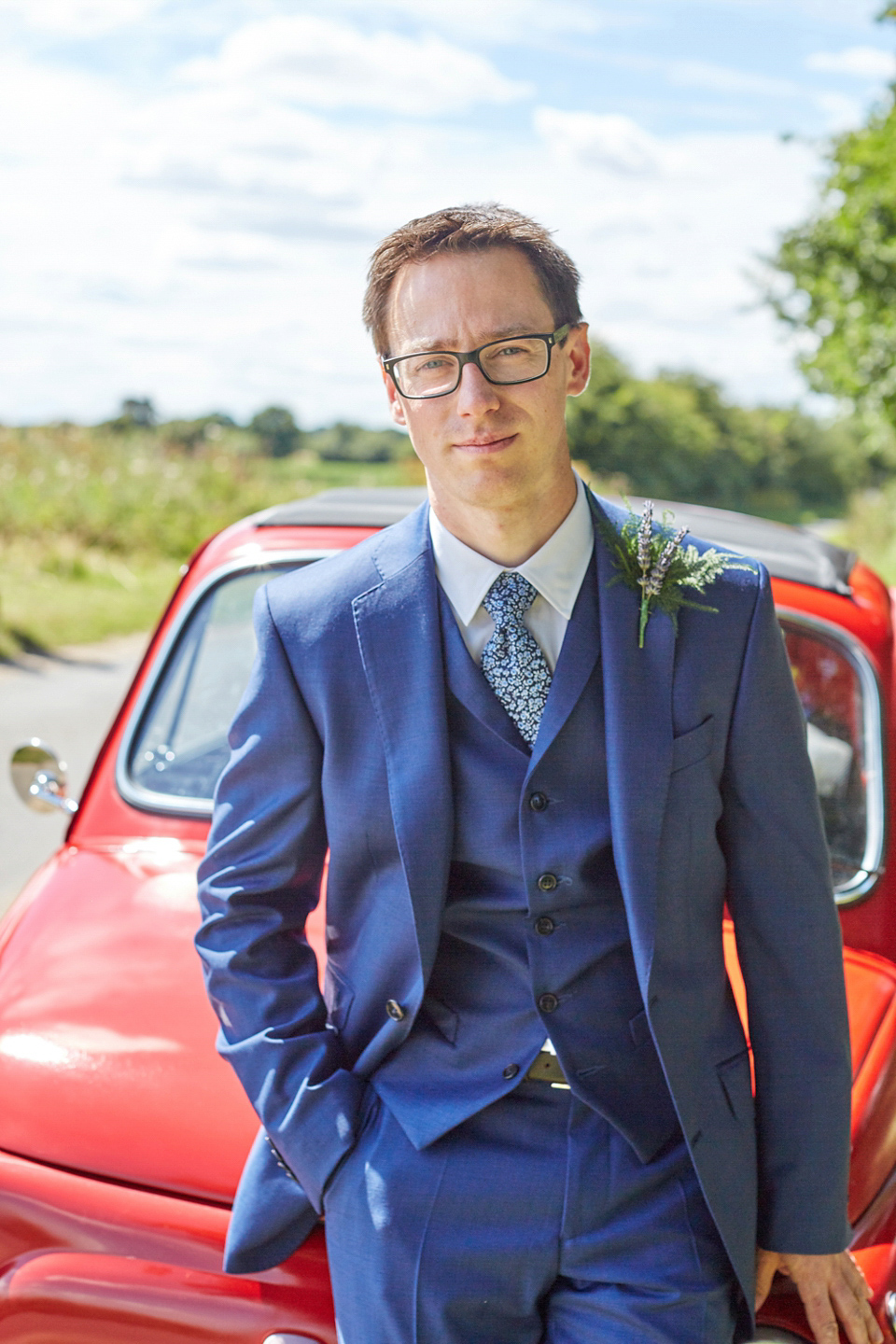 A fabulous 1950's Fur Coat No Knickers dress for a flower-filled Norfolk countryside wedding. Images by Fuller Photography.