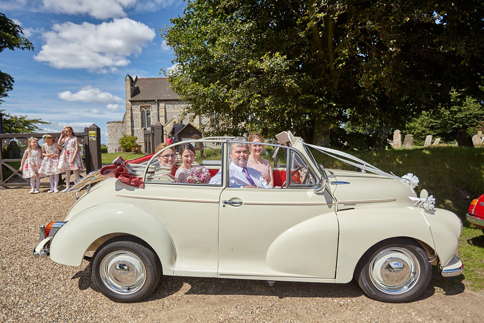 A fabulous 1950's Fur Coat No Knickers dress for a flower-filled Norfolk countryside wedding. Images by Fuller Photography.