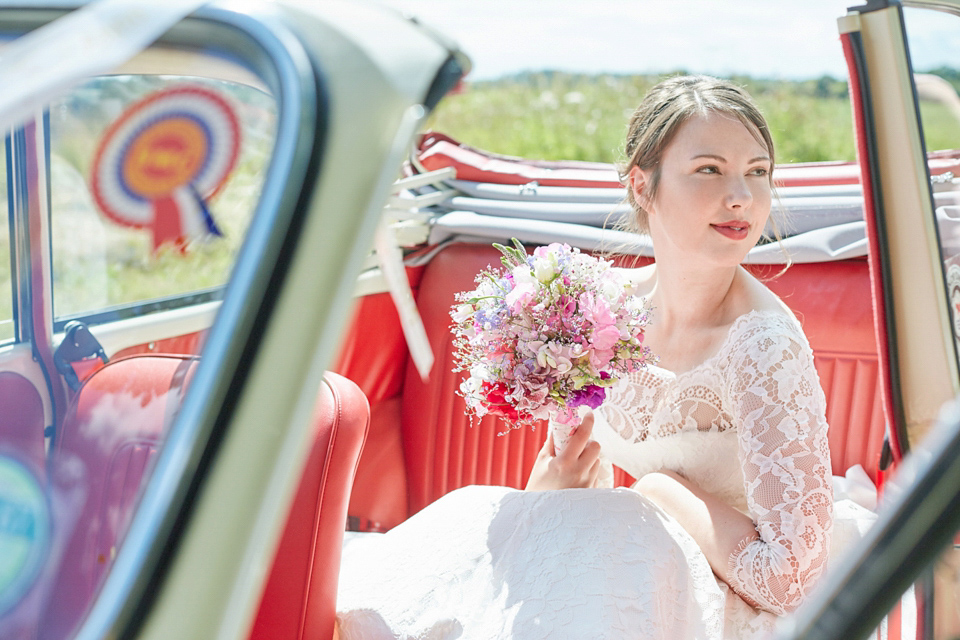 A fabulous 1950's Fur Coat No Knickers dress for a flower-filled Norfolk countryside wedding. Images by Fuller Photography.