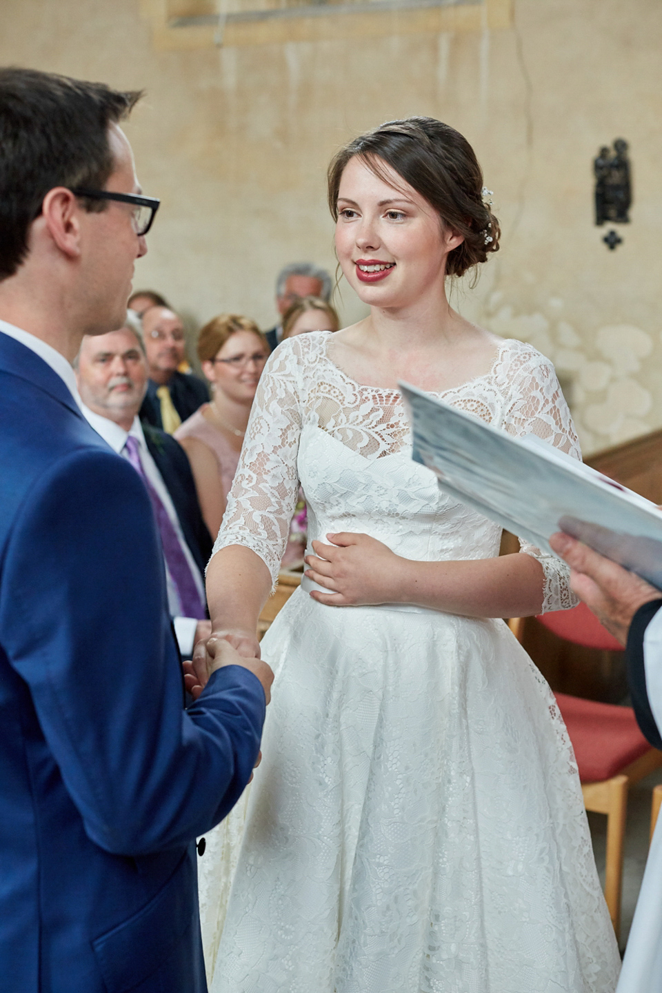 A fabulous 1950's Fur Coat No Knickers dress for a flower-filled Norfolk countryside wedding. Images by Fuller Photography.