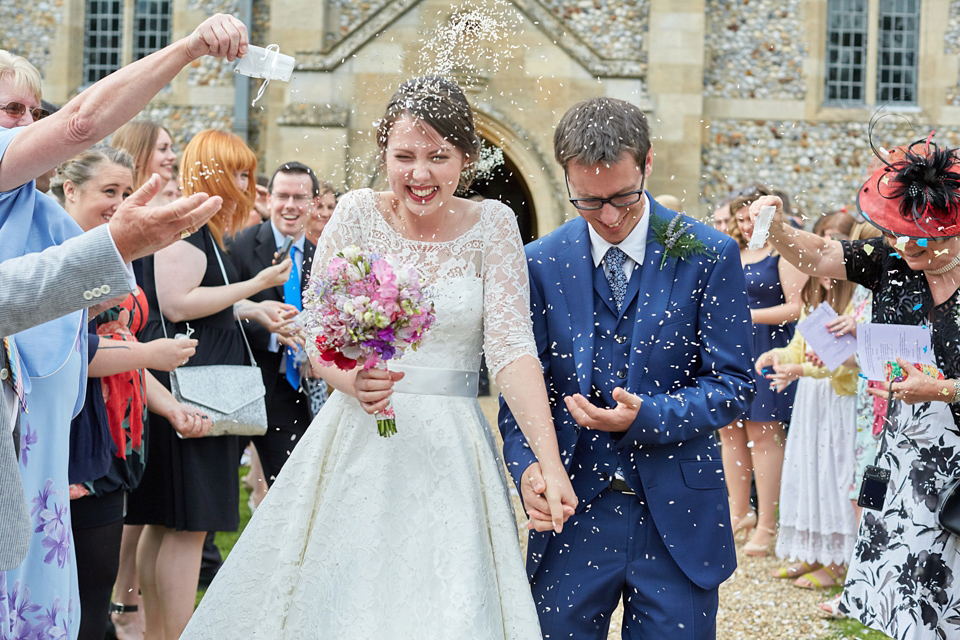 A fabulous 1950's Fur Coat No Knickers dress for a flower-filled Norfolk countryside wedding. Images by Fuller Photography.