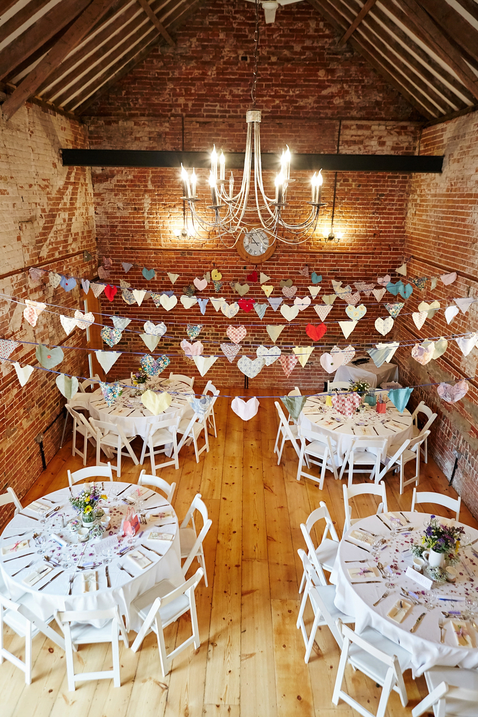 A fabulous 1950's Fur Coat No Knickers dress for a flower-filled Norfolk countryside wedding. Images by Fuller Photography.