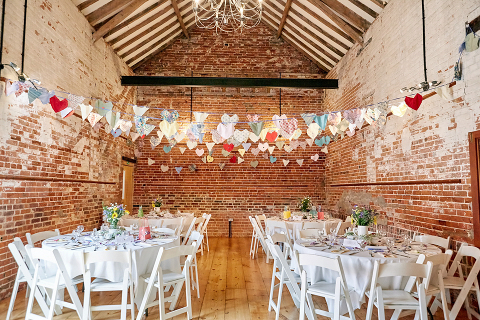 A fabulous 1950's Fur Coat No Knickers dress for a flower-filled Norfolk countryside wedding. Images by Fuller Photography.