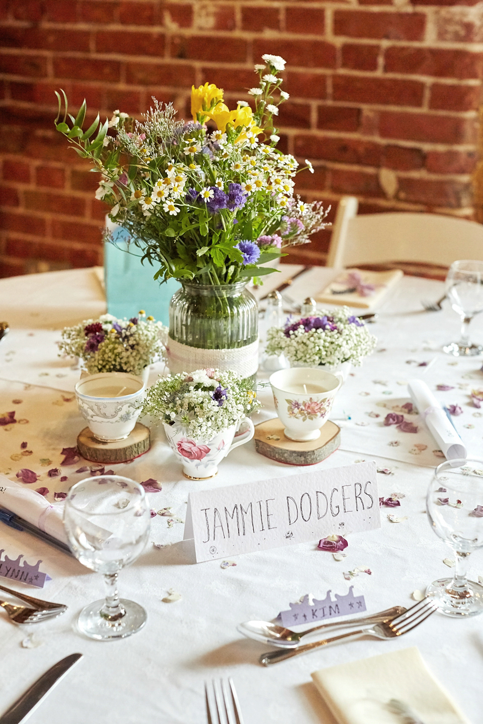 A fabulous 1950's Fur Coat No Knickers dress for a flower-filled Norfolk countryside wedding. Images by Fuller Photography.