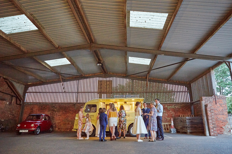 A fabulous 1950's Fur Coat No Knickers dress for a flower-filled Norfolk countryside wedding. Images by Fuller Photography.