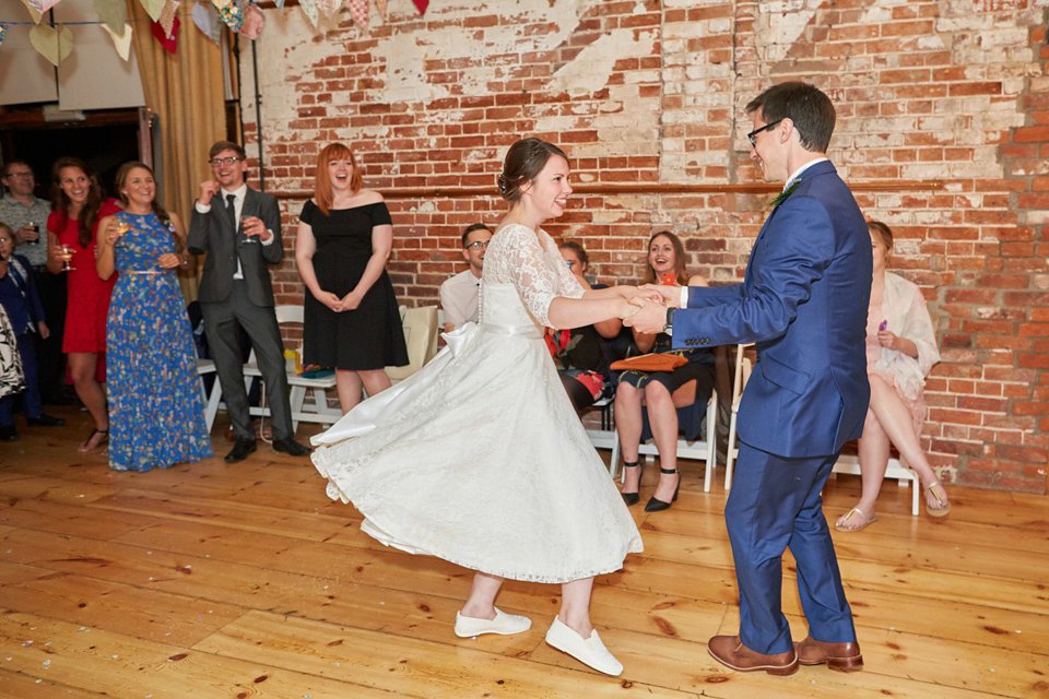 A fabulous 1950's Fur Coat No Knickers dress for a flower-filled Norfolk countryside wedding. Images by Fuller Photography.