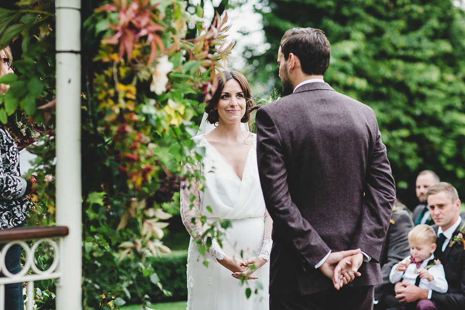 Bride Abby wears a gown by Wilden Bride of London for her Autumn wedding at Lemore Manor in Herefordshire. Photography by Sarah Beth, flowers by Juliet Glaves.