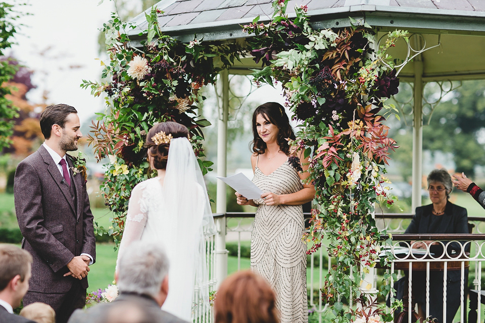 Bride Abby wears a gown by Wilden Bride of London for her Autumn wedding at Lemore Manor in Herefordshire. Photography by Sarah Beth, flowers by Juliet Glaves.