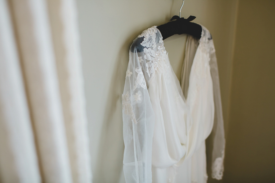 Bride Abby wears a gown by Wilden Bride of London for her Autumn wedding at Lemore Manor in Herefordshire. Photography by Sarah Beth, flowers by Juliet Glaves.