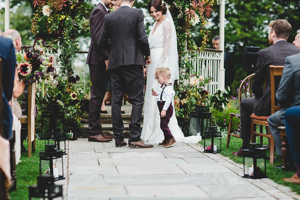 Bride Abby wears a gown by Wilden Bride of London for her Autumn wedding at Lemore Manor in Herefordshire. Photography by Sarah Beth, flowers by Juliet Glaves.