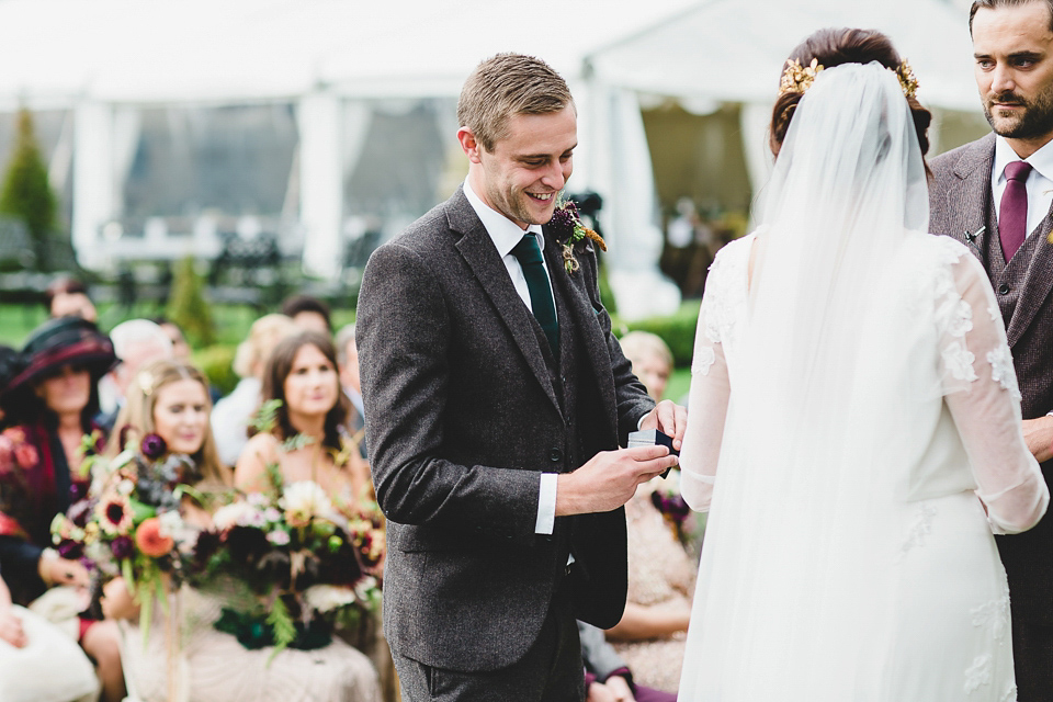 Bride Abby wears a gown by Wilden Bride of London for her Autumn wedding at Lemore Manor in Herefordshire. Photography by Sarah Beth, flowers by Juliet Glaves.