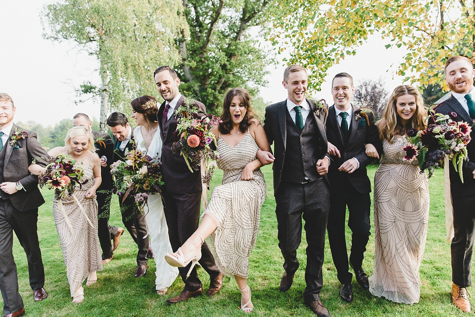 Bride Abby wears a gown by Wilden Bride of London for her Autumn wedding at Lemore Manor in Herefordshire. Photography by Sarah Beth, flowers by Juliet Glaves.