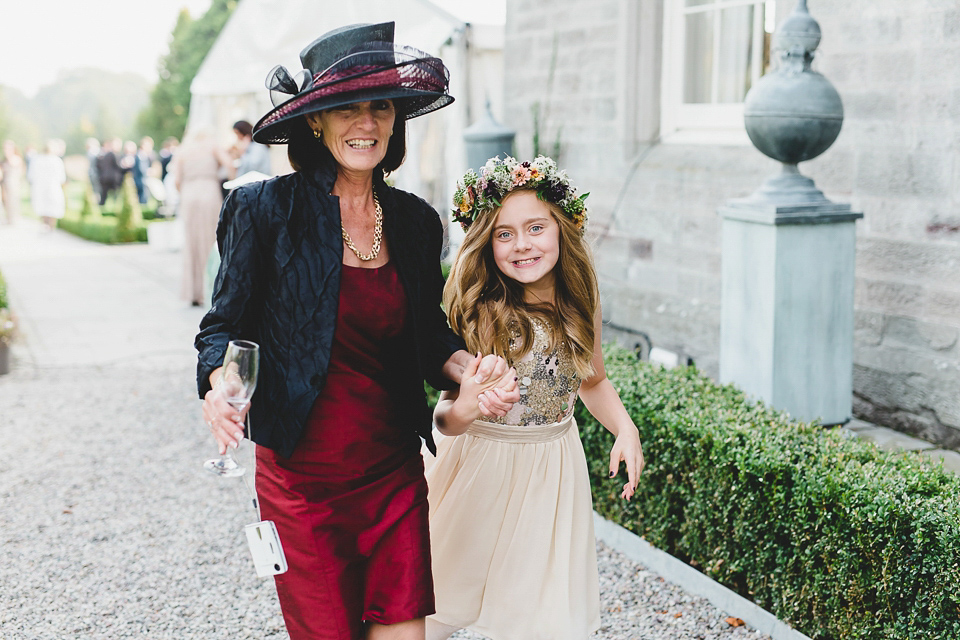 Bride Abby wears a gown by Wilden Bride of London for her Autumn wedding at Lemore Manor in Herefordshire. Photography by Sarah Beth, flowers by Juliet Glaves.