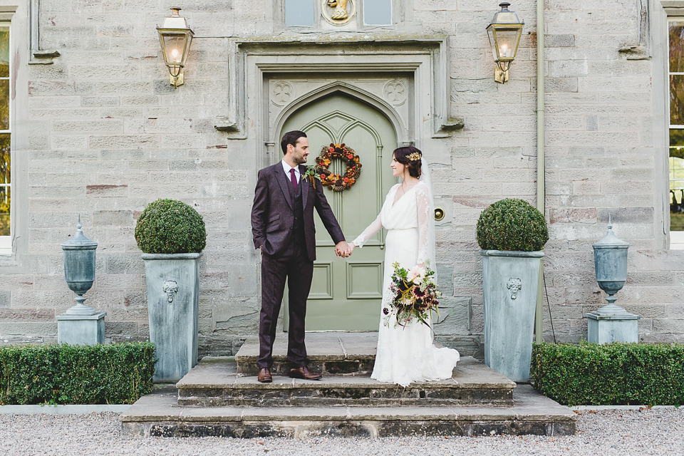 Bride Abby wears a gown by Wilden Bride of London for her Autumn wedding at Lemore Manor in Herefordshire. Photography by Sarah Beth, flowers by Juliet Glaves.