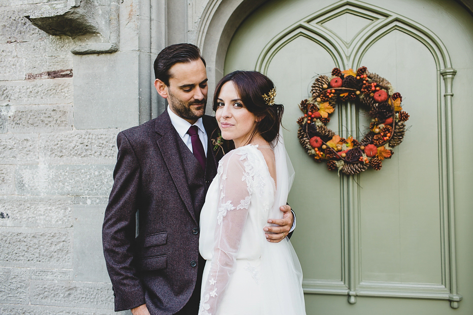 Bride Abby wears a gown by Wilden Bride of London for her Autumn wedding at Lemore Manor in Herefordshire. Photography by Sarah Beth, flowers by Juliet Glaves.