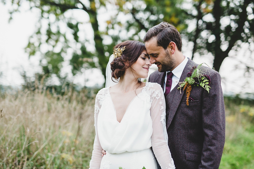 Bride Abby wears a gown by Wilden Bride of London for her Autumn wedding at Lemore Manor in Herefordshire. Photography by Sarah Beth, flowers by Juliet Glaves.