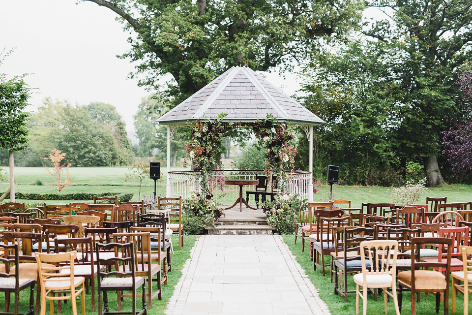 Bride Abby wears a gown by Wilden Bride of London for her Autumn wedding at Lemore Manor in Herefordshire. Photography by Sarah Beth, flowers by Juliet Glaves.