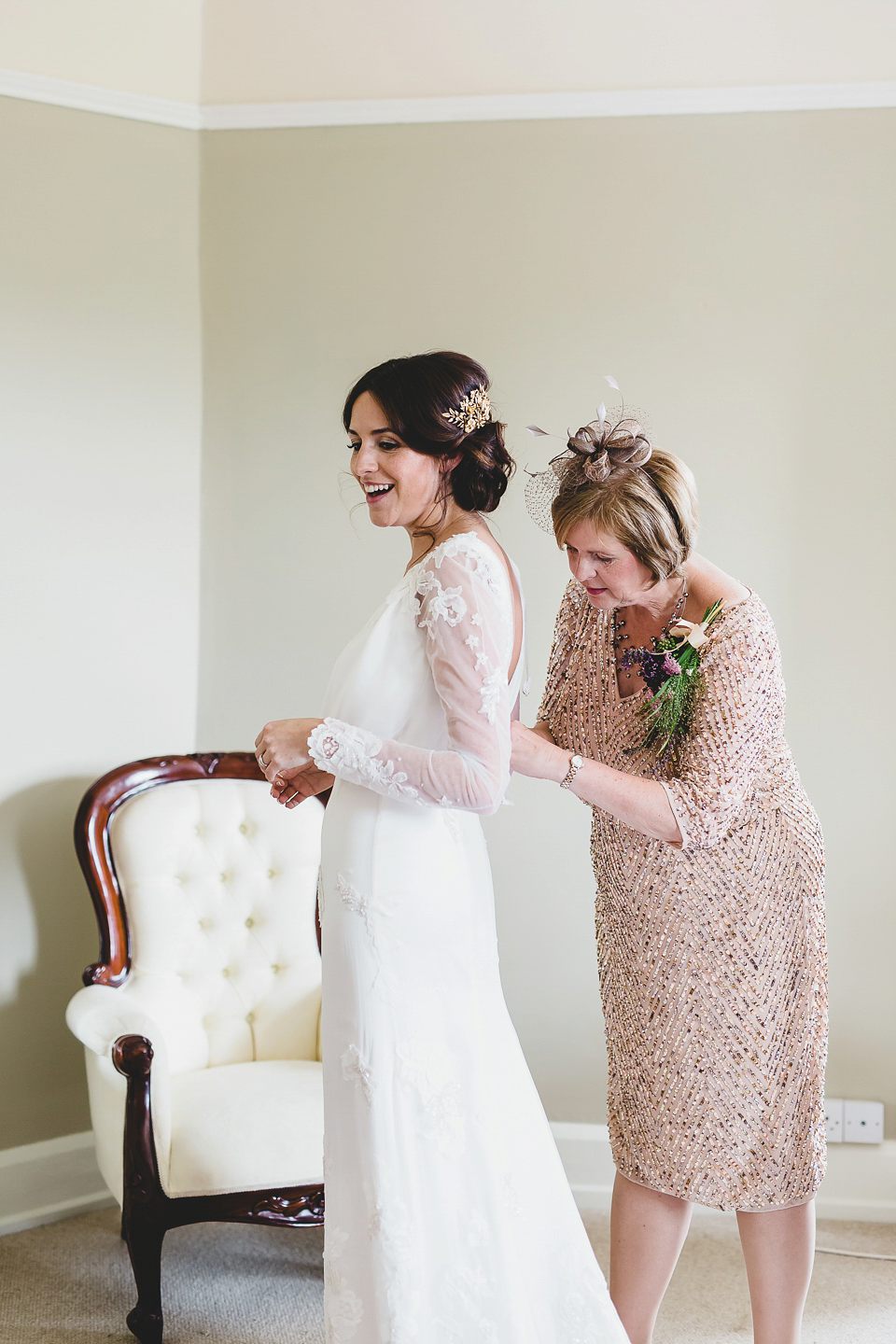 Bride Abby wears a gown by Wilden Bride of London for her Autumn wedding at Lemore Manor in Herefordshire. Photography by Sarah Beth, flowers by Juliet Glaves.