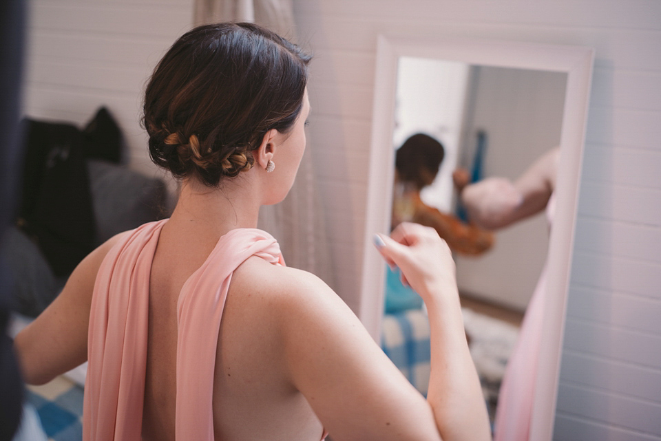 A blue sequin wedding dress for a colourful and flower filled picnic wedding. Photography by Sarah Burton.