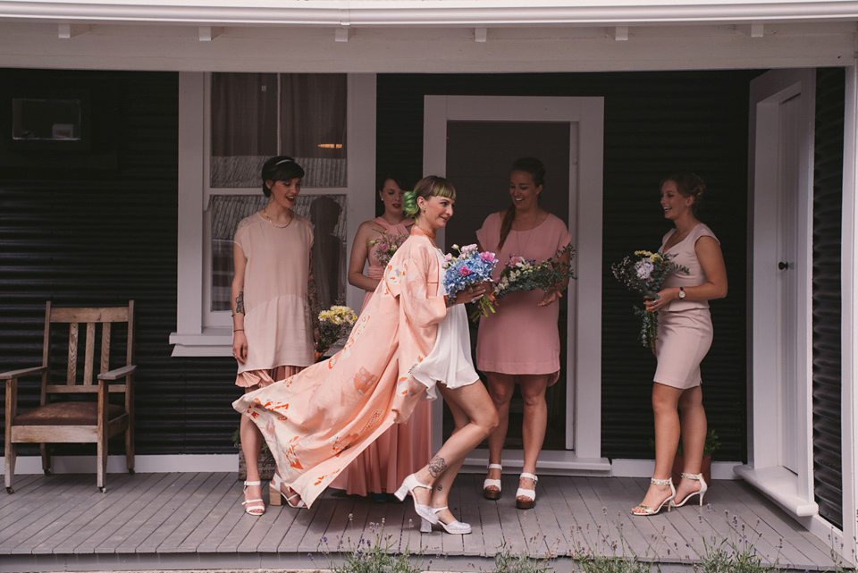 A blue sequin wedding dress for a colourful and flower filled picnic wedding. Photography by Sarah Burton.