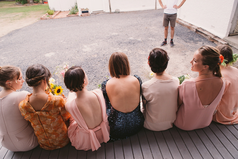 A blue sequin wedding dress for a colourful and flower filled picnic wedding. Photography by Sarah Burton.