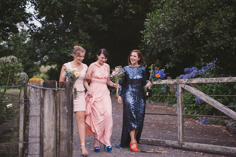 A blue sequin wedding dress for a colourful and flower filled picnic wedding. Photography by Sarah Burton.