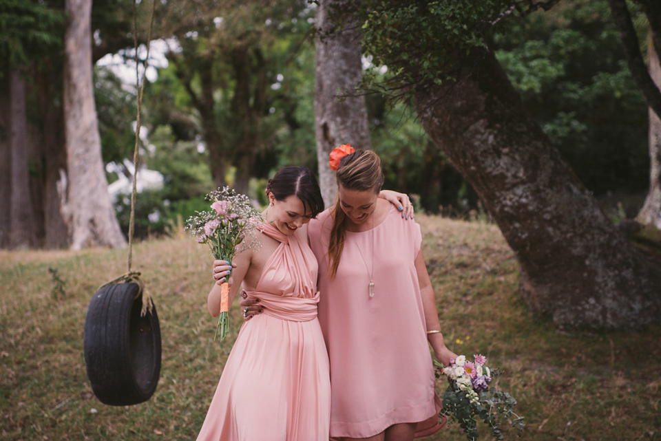 A blue sequin wedding dress for a colourful and flower filled picnic wedding. Photography by Sarah Burton.